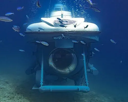 Family enjoying Hurghada submarine tour in crystal-clear waters